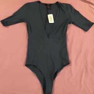 Turquoise plunge neck bodysuit
